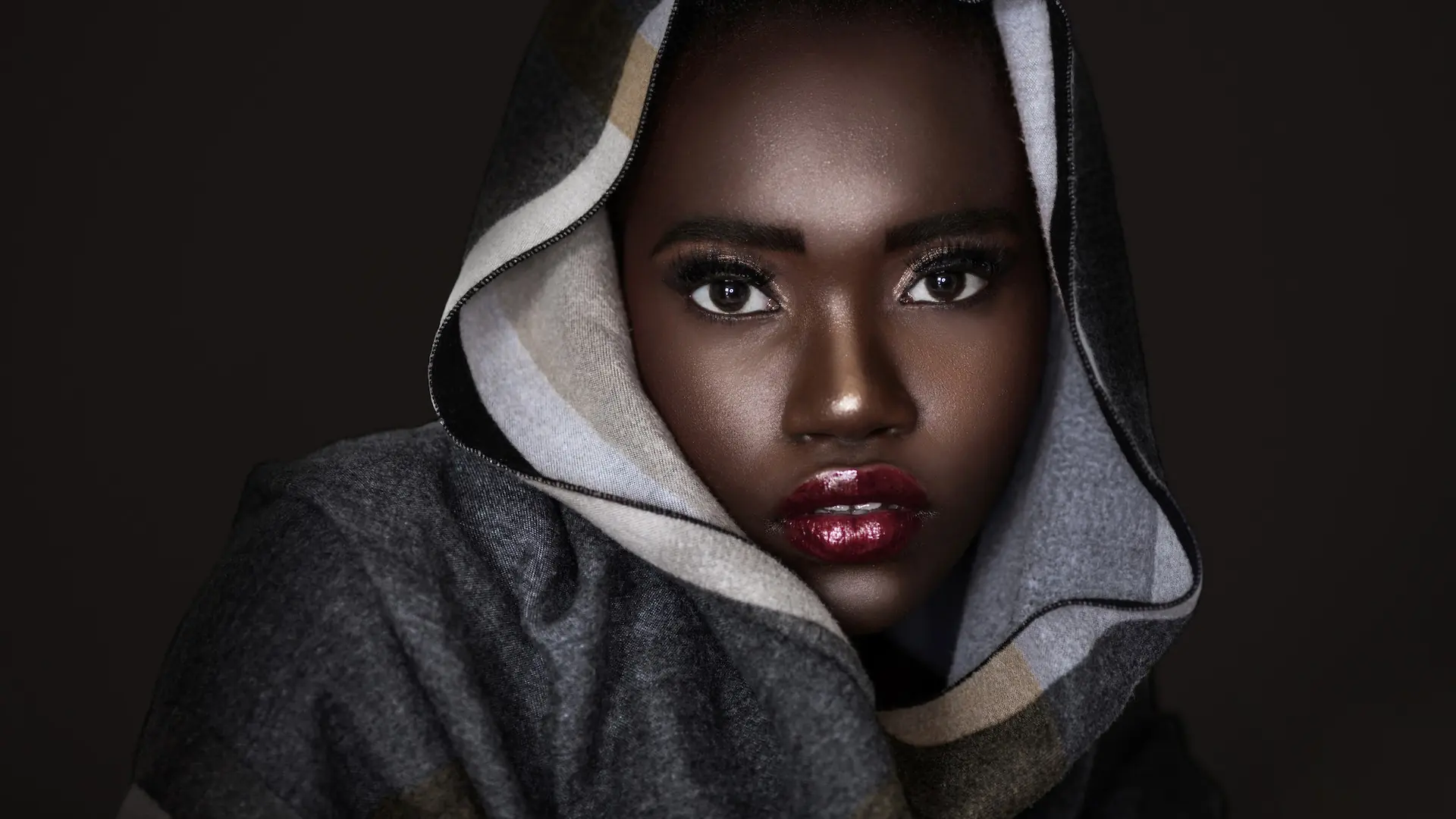 Clean & Serene: How Beauty Editorial Creative Direction Turned a Mood Board into a Published Story - Phil Halfmann Beauty editorial creative direction close-up framed by a gray checked scarf and deep red glossy lips
