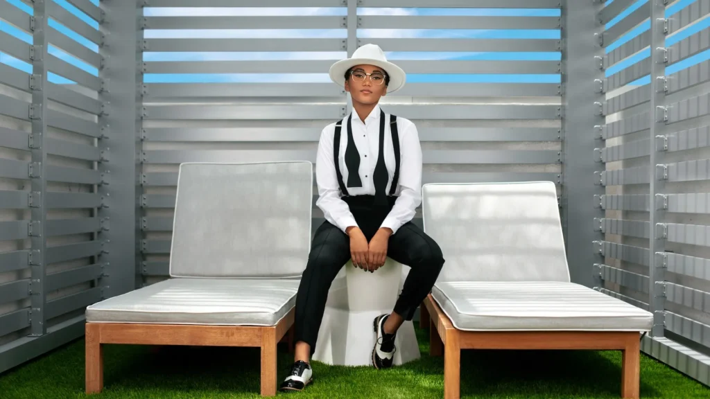 Jordan Kristine Seamon in a white fedora and tailored black-and-white look during a planned Prestige Magazine production
