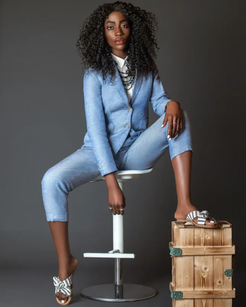 Spring Is in the Air fashion editorial portrait with blue suit, stool and wooden prop