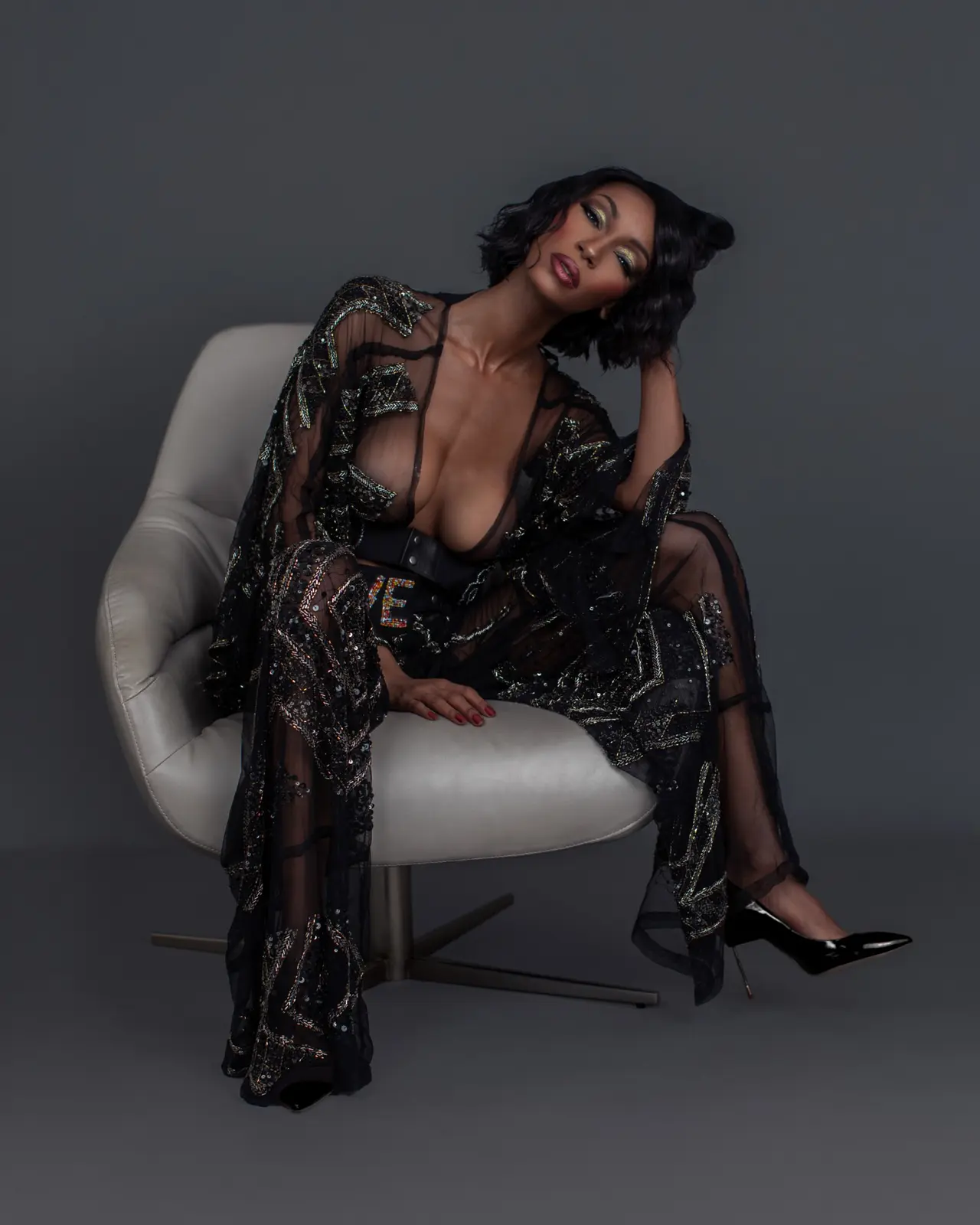 Black embellished eveningwear portrait within Tanya Marie’s multi-look content infrastructure