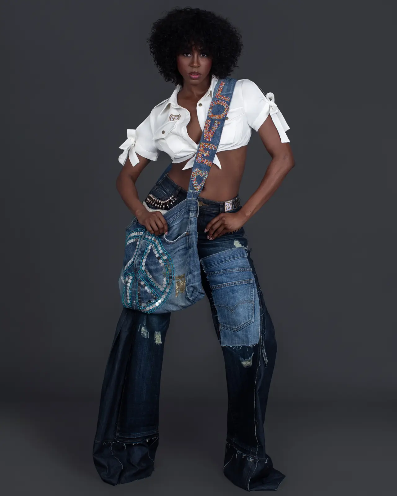 Full-length denim campaign image expanding Tanya Marie’s content infrastructure across wardrobe stories