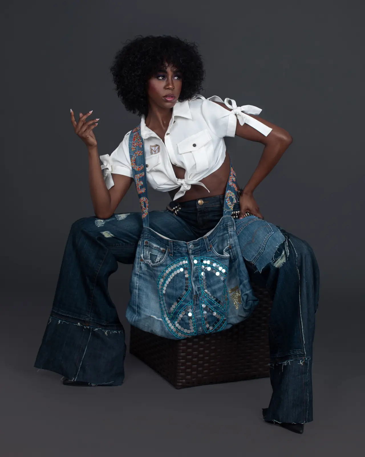Seated Tanya Marie denim editorial created as a supporting content infrastructure asset