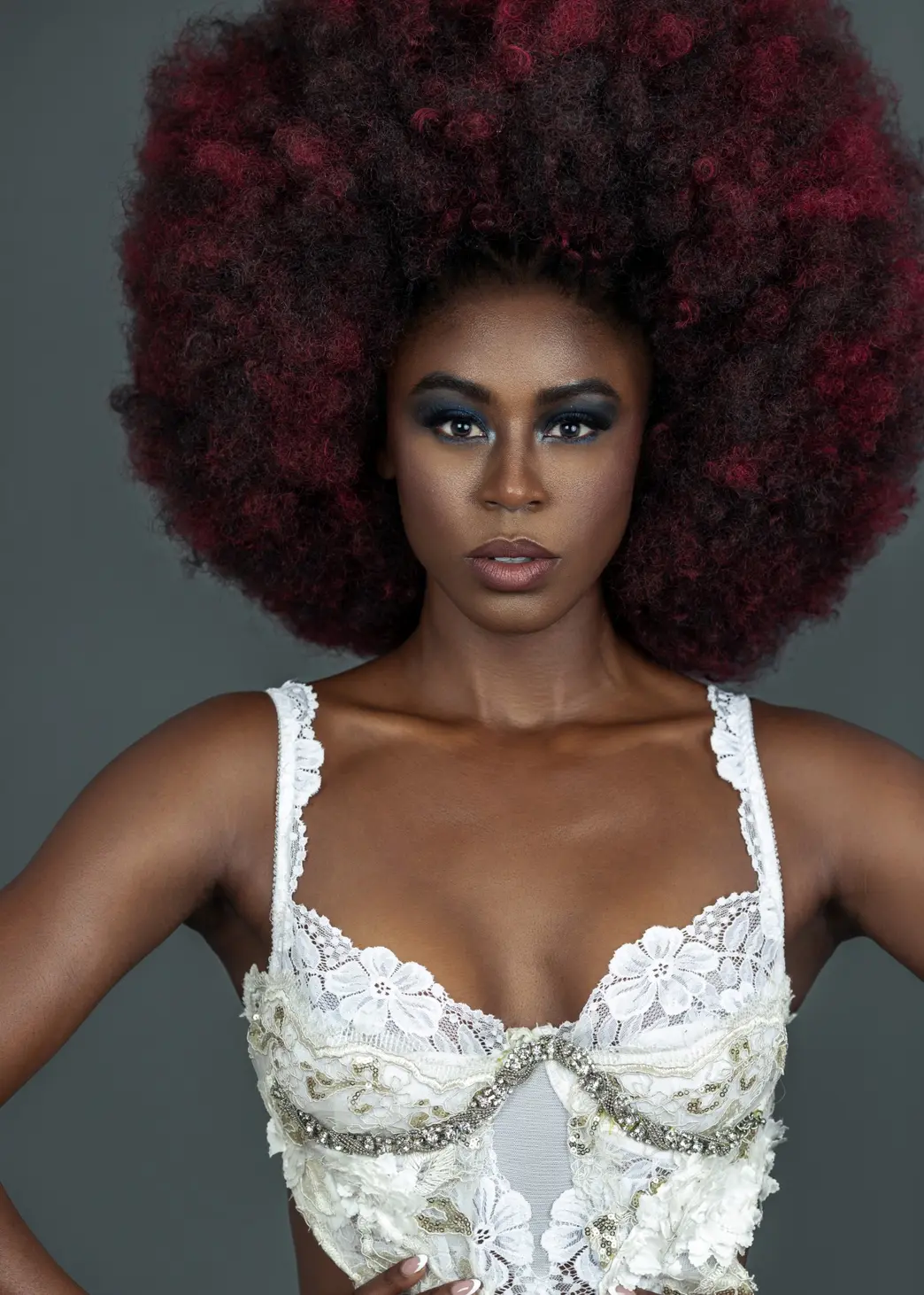 Close portrait highlighting Tanya Marie white corset details within the content infrastructure library