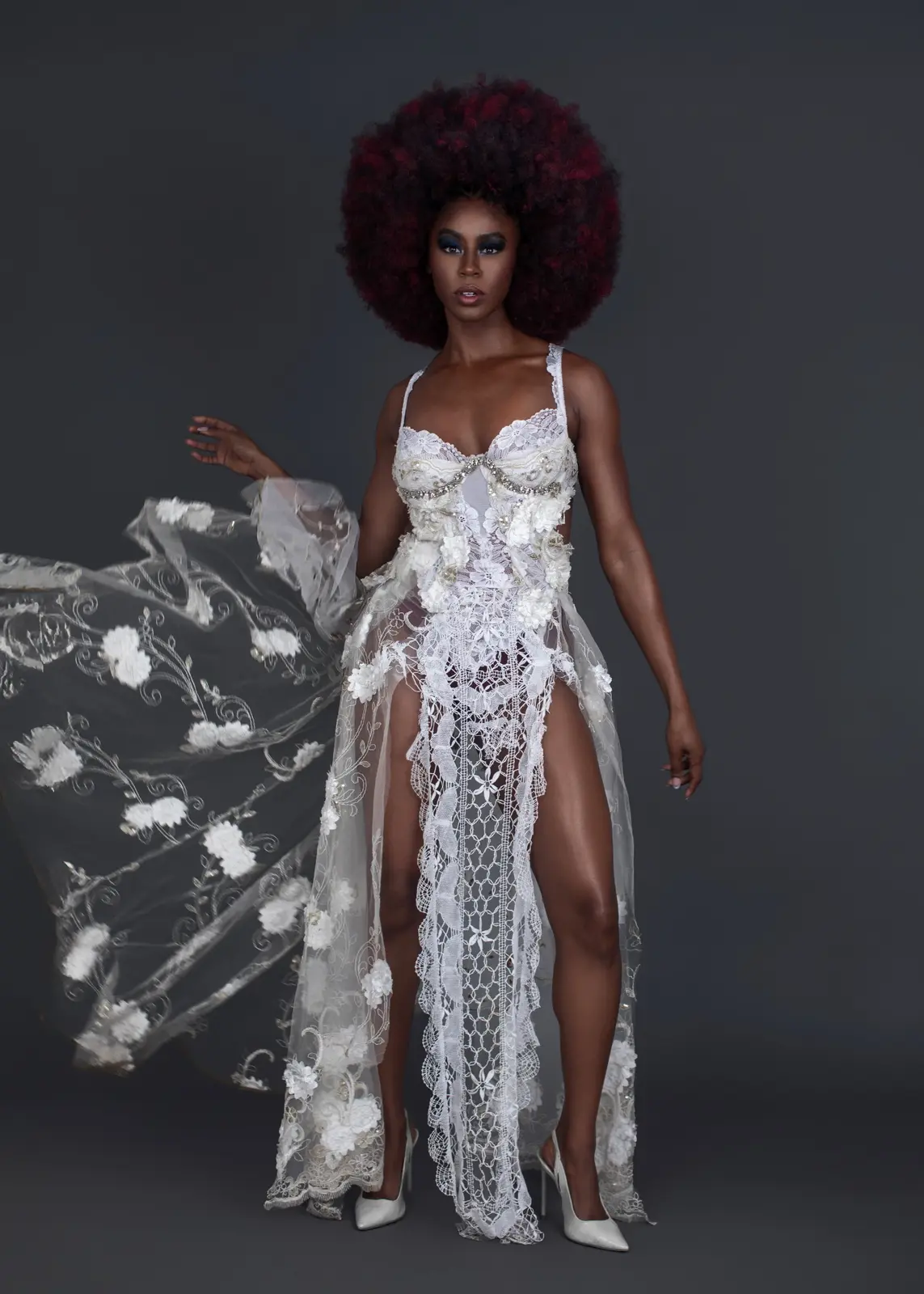 Full-length white eveningwear image showing movement within Tanya Marie’s content infrastructure