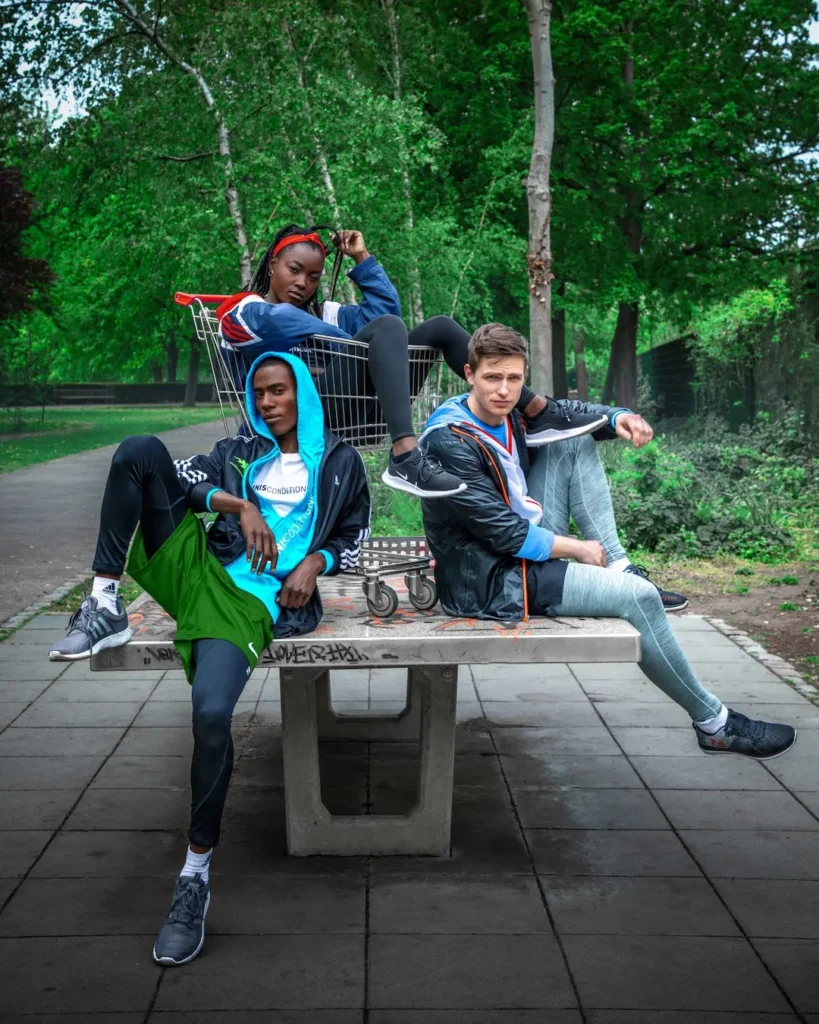 Berlin in Motion: A Sports Campaign Built Across Stills and Film - Phil Halfmann Young athletes relaxing beside an outdoor basketball court in Berlin