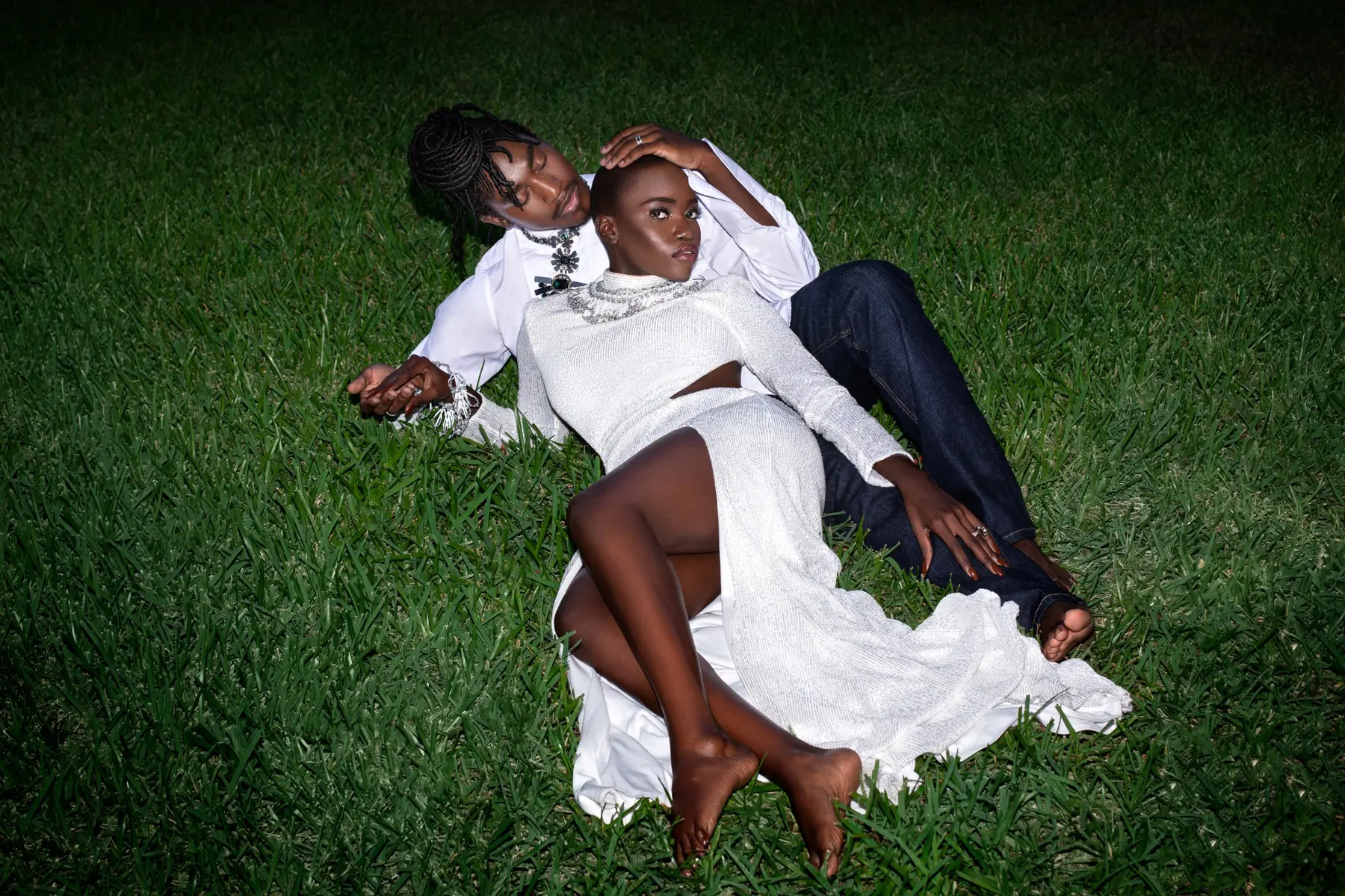 Gaelle and Djanto reclining in a close campaign variation from the same editorial production