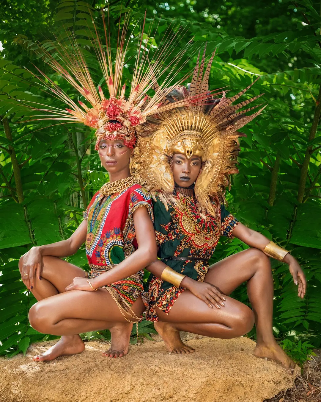Sculptural Headpieces in Berlin: Building a Cohesive Fashion Editorial Across Six Models - Phil Halfmann Editorial duo wearing red and gold sculptural headpieces against tropical foliage