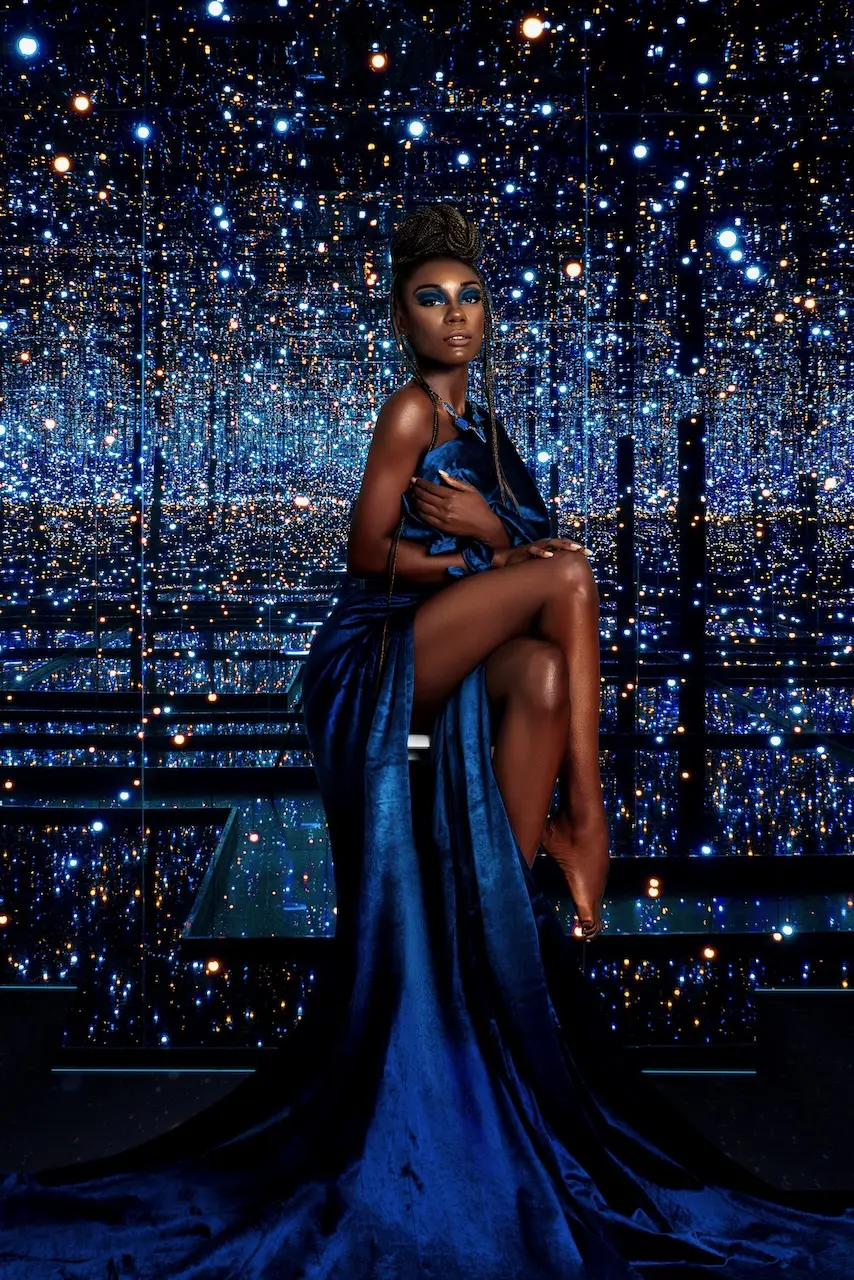 What to Expect From a Fashion Campaign Photographer - Phil Halfmann Ann-neika wearing a sculptural blue dress in the Colour Me Beautiful editorial